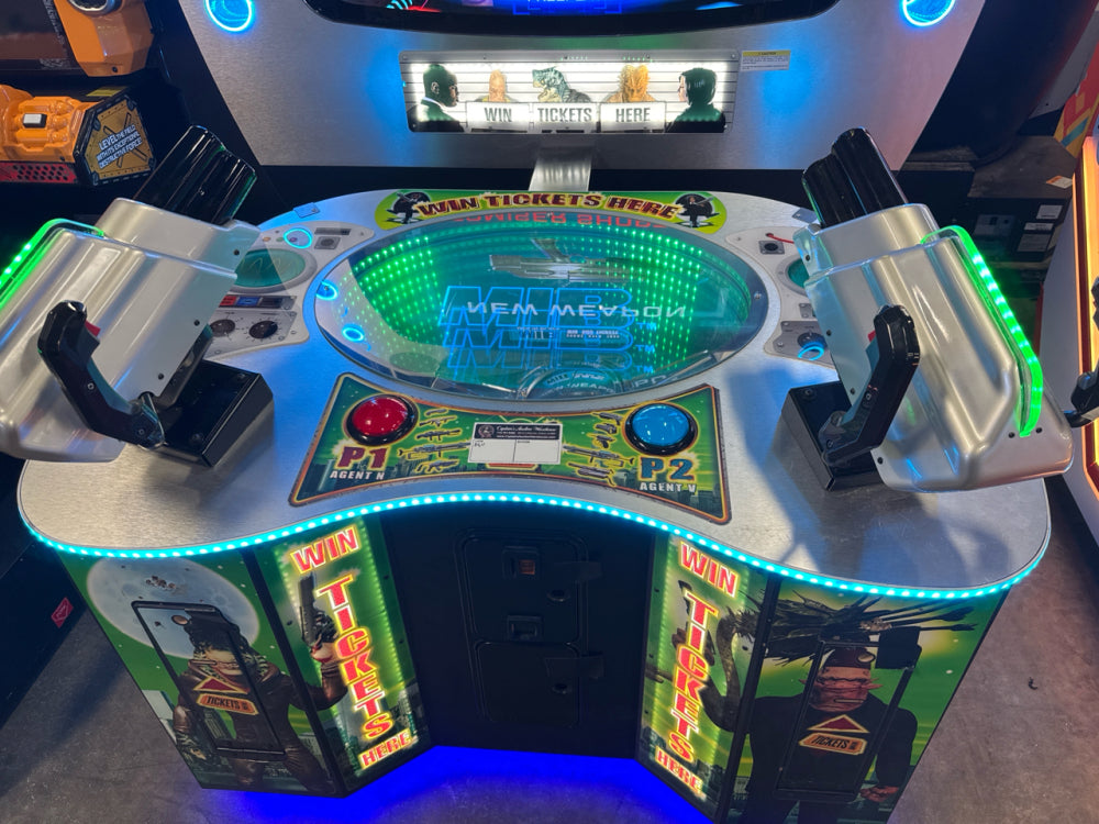 Men in Black skill-based video redemption arcade machine with interactive shooting gameplay and themed graphics