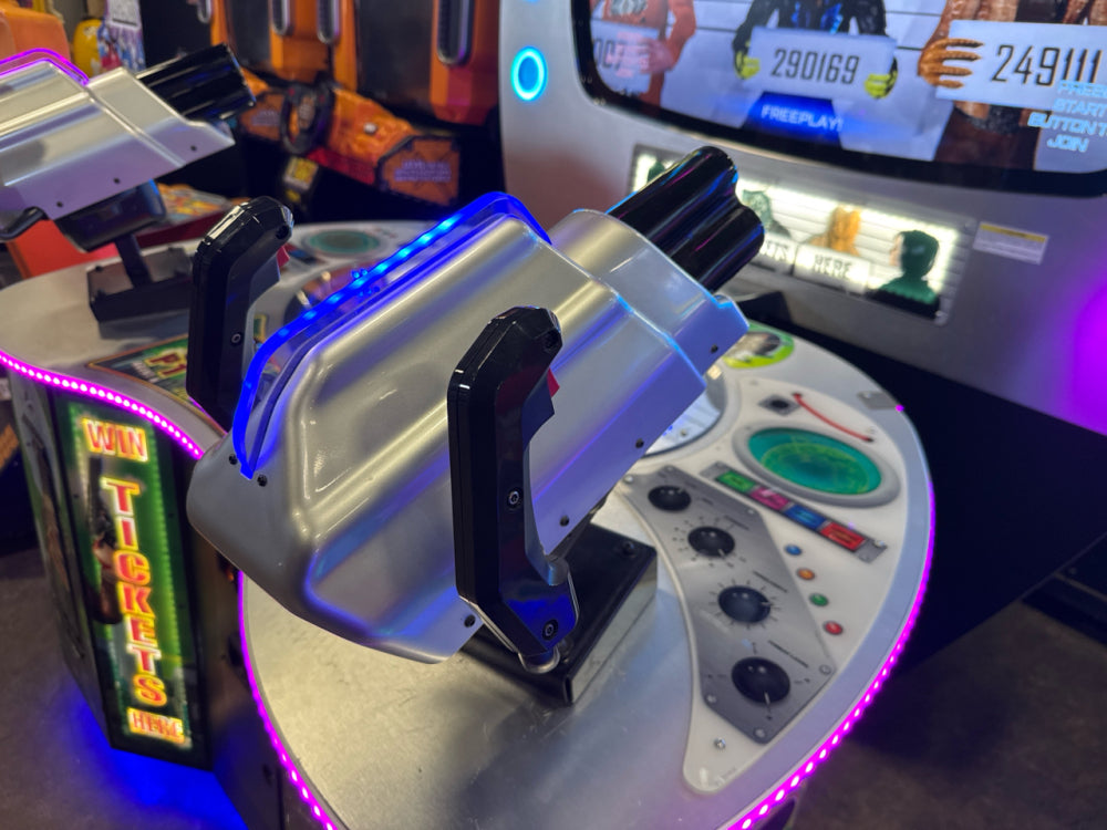 Men in Black skill-based video redemption arcade machine with interactive shooting gameplay and themed graphics