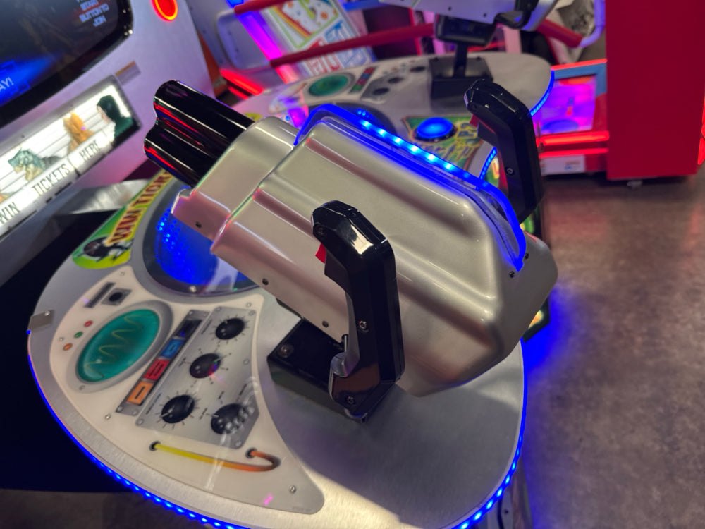 Men in Black skill-based video redemption arcade machine with interactive shooting gameplay and themed graphics