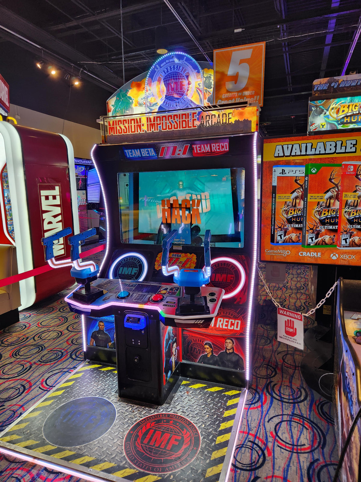 Mission: Impossible Arcade DLX deluxe 2-player action video arcade machine with immersive dual-seat setup and large HD display