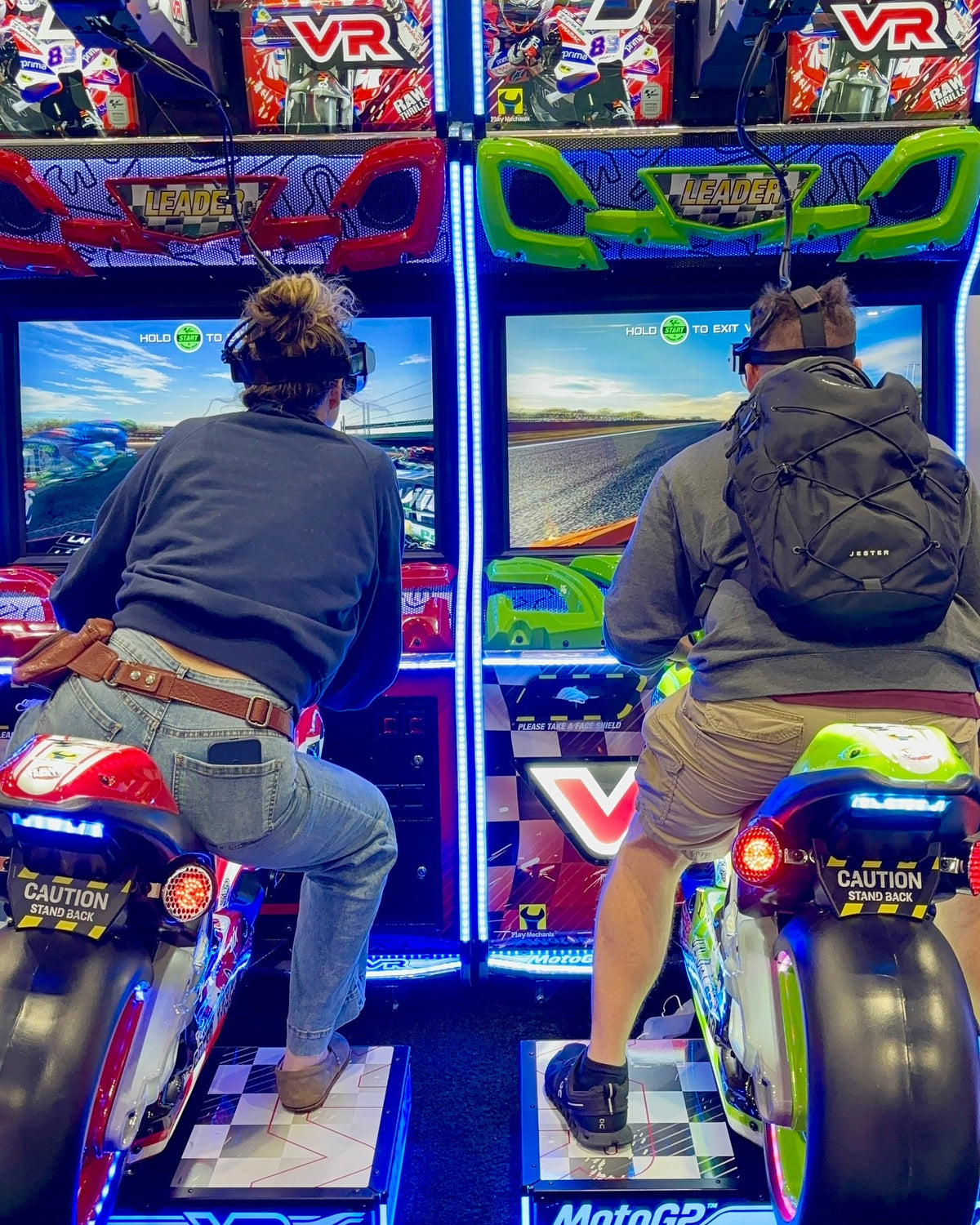 MotoGP VR arcade machine with 360° virtual reality motorcycle racing, official tracks, and HP Reverb G2 headset.