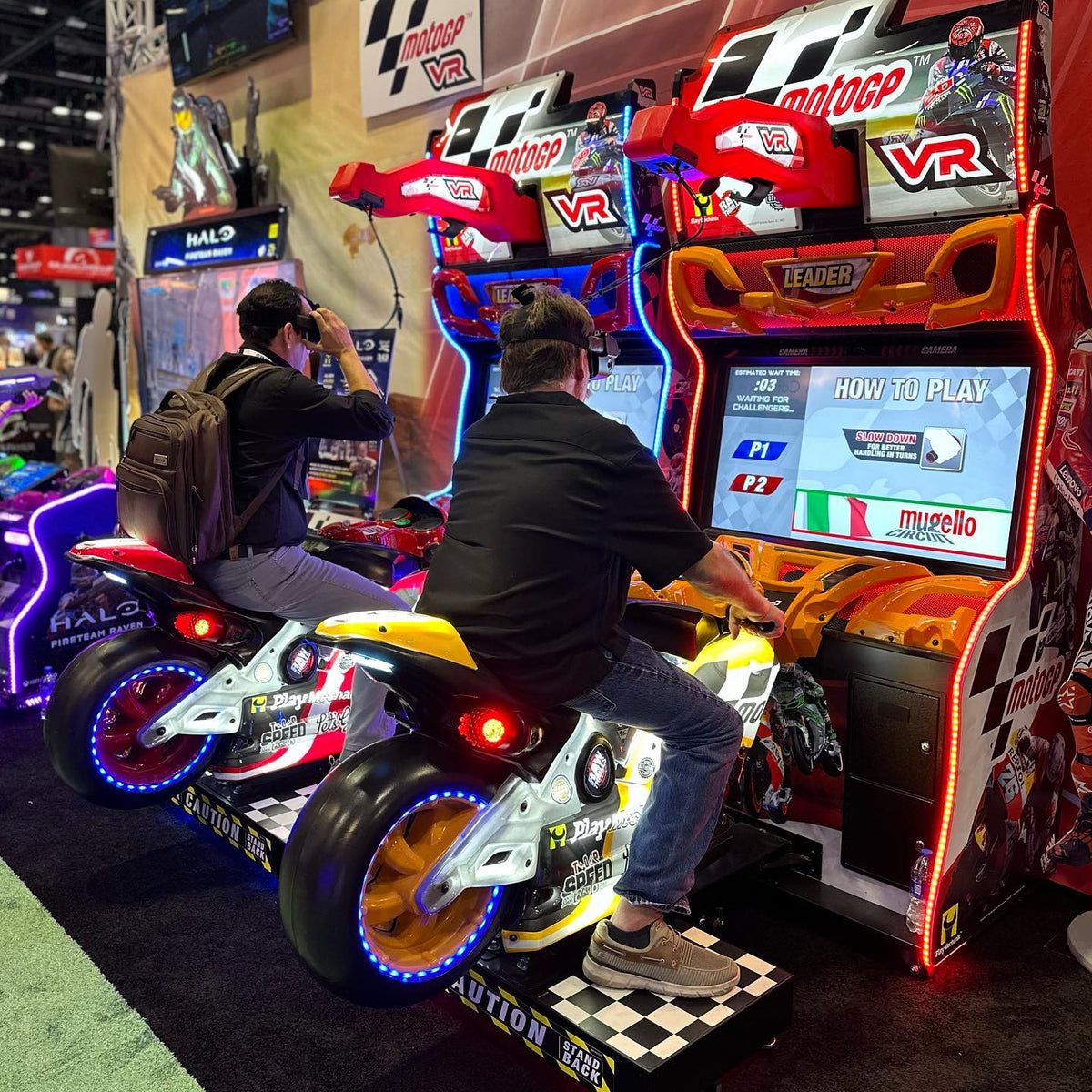 MotoGP VR arcade machine with 360° virtual reality motorcycle racing, official tracks, and HP Reverb G2 headset.