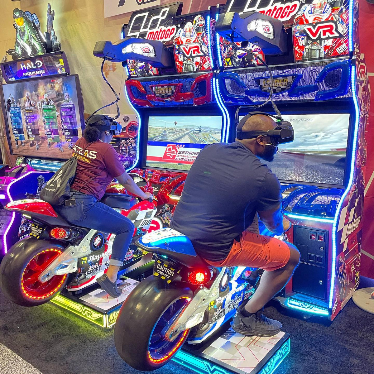 MotoGP VR arcade machine with 360° virtual reality motorcycle racing, official tracks, and HP Reverb G2 headset.