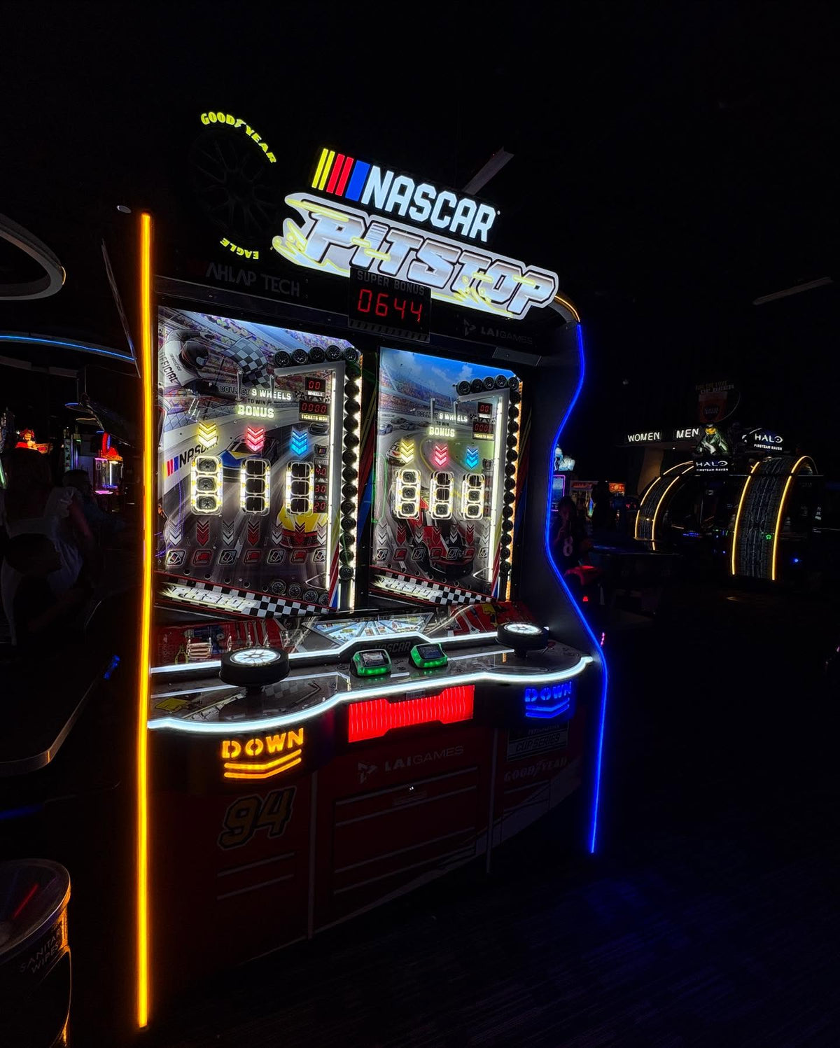 NASCAR Pit Stop arcade game with 2-player skill-based redemption gameplay and licensed NASCAR branding.