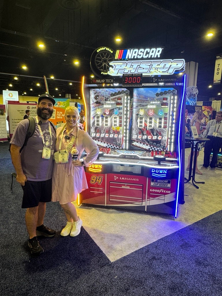 NASCAR Pit Stop arcade game with 2-player skill-based redemption gameplay and licensed NASCAR branding.