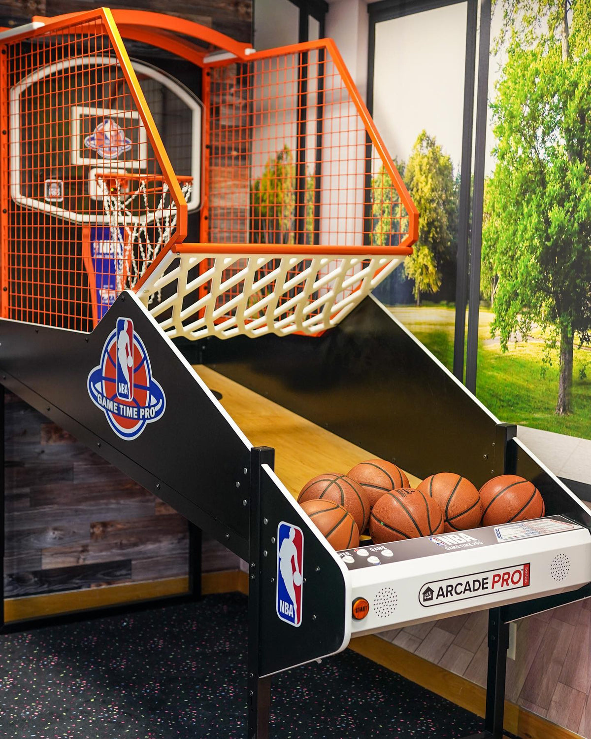 NBA Game Time Pro 8-foot basketball arcade by ICE Games with real hardwood floor, adjustable height, and 4-player Pop-A-Shot gameplay.