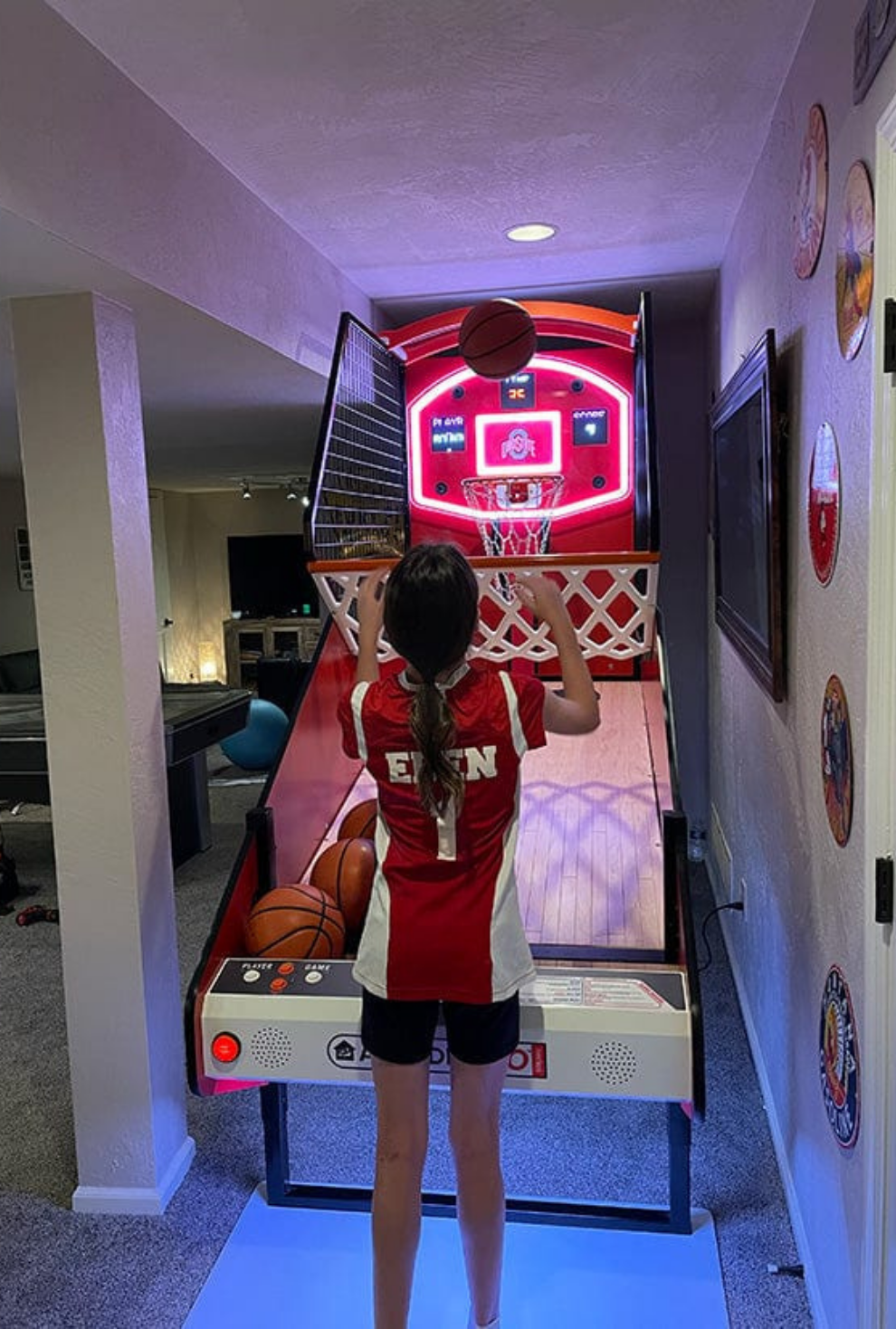 NBA Game Time Pro 8-foot basketball arcade by ICE Games with real hardwood floor, adjustable height, and 4-player Pop-A-Shot gameplay.