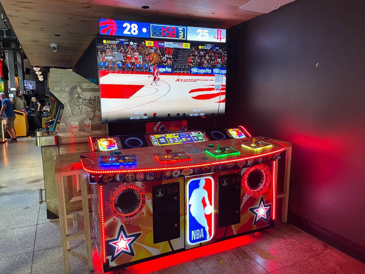 NBA Superstars arcade machine with 4-player basketball gameplay, 75-inch HD display, and official NBA teams and players.