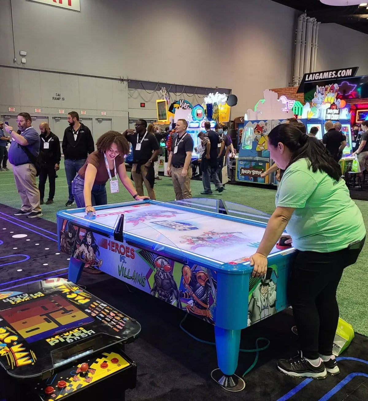 Namco DC Superheroes air hockey table with LED-lit playfield, electronic scoring, and official DC heroes vs villains artwork