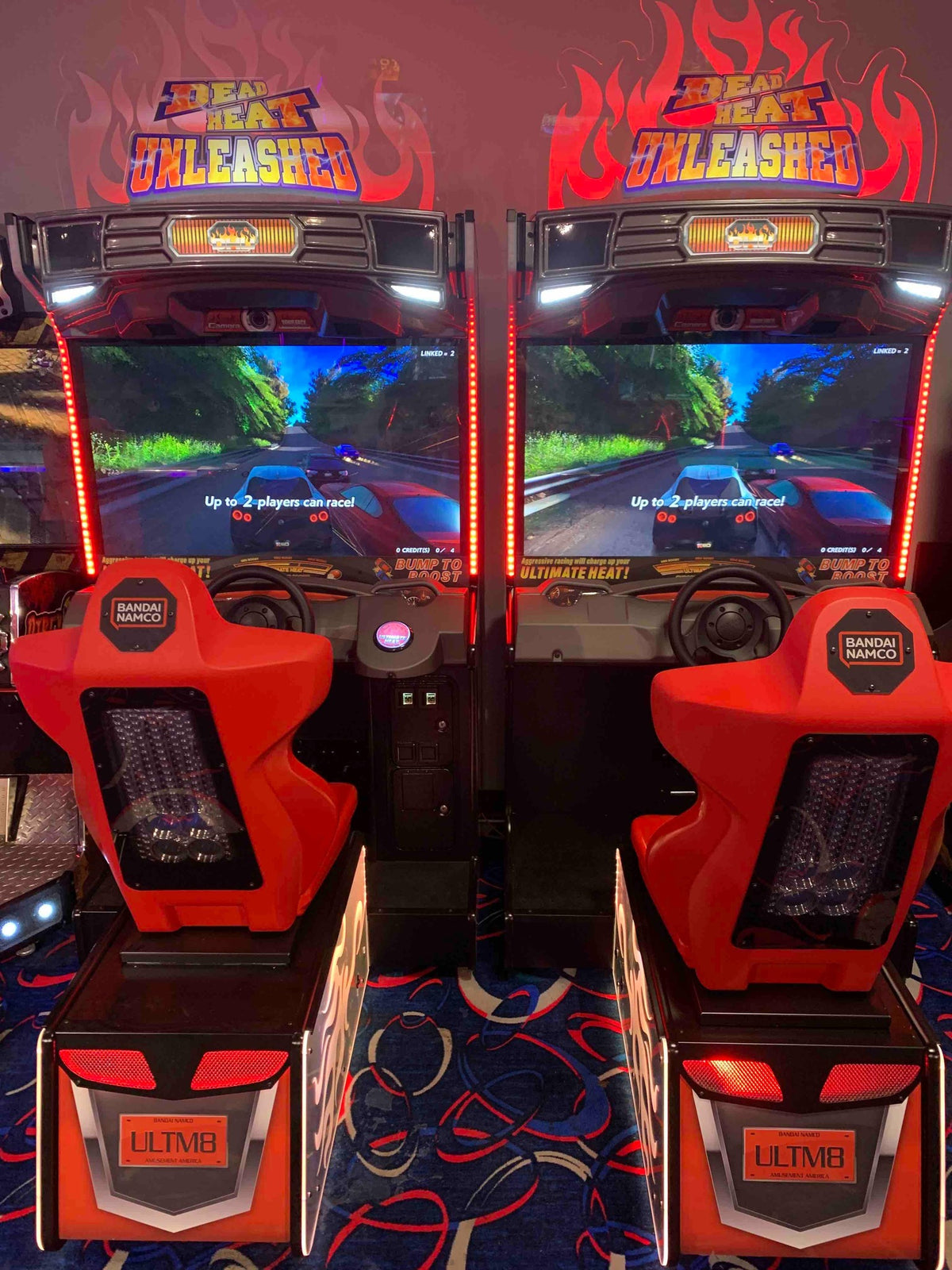 Namco Dead Heat Unleashed arcade game with 43-inch HD screen, 4-player linkable street racing, and LED-lit cabinet.