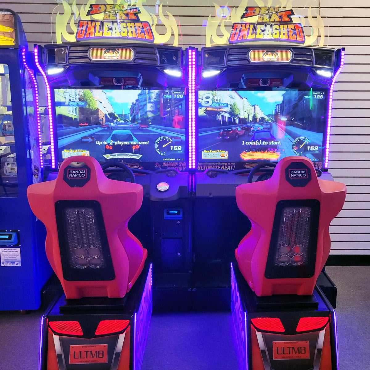 Namco Dead Heat Unleashed arcade game with 43-inch HD screen, 4-player linkable street racing, and LED-lit cabinet.