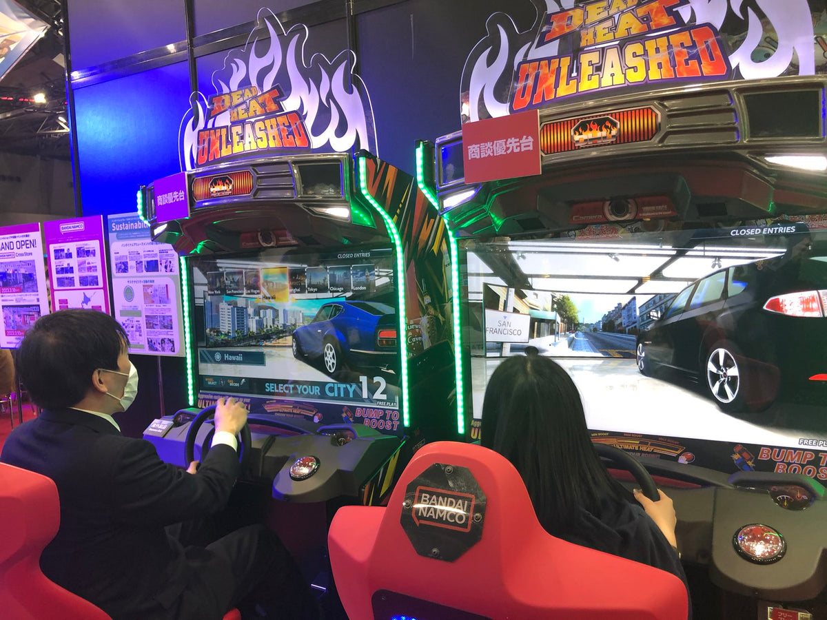 Namco Dead Heat Unleashed arcade game with 43-inch HD screen, 4-player linkable street racing, and LED-lit cabinet.