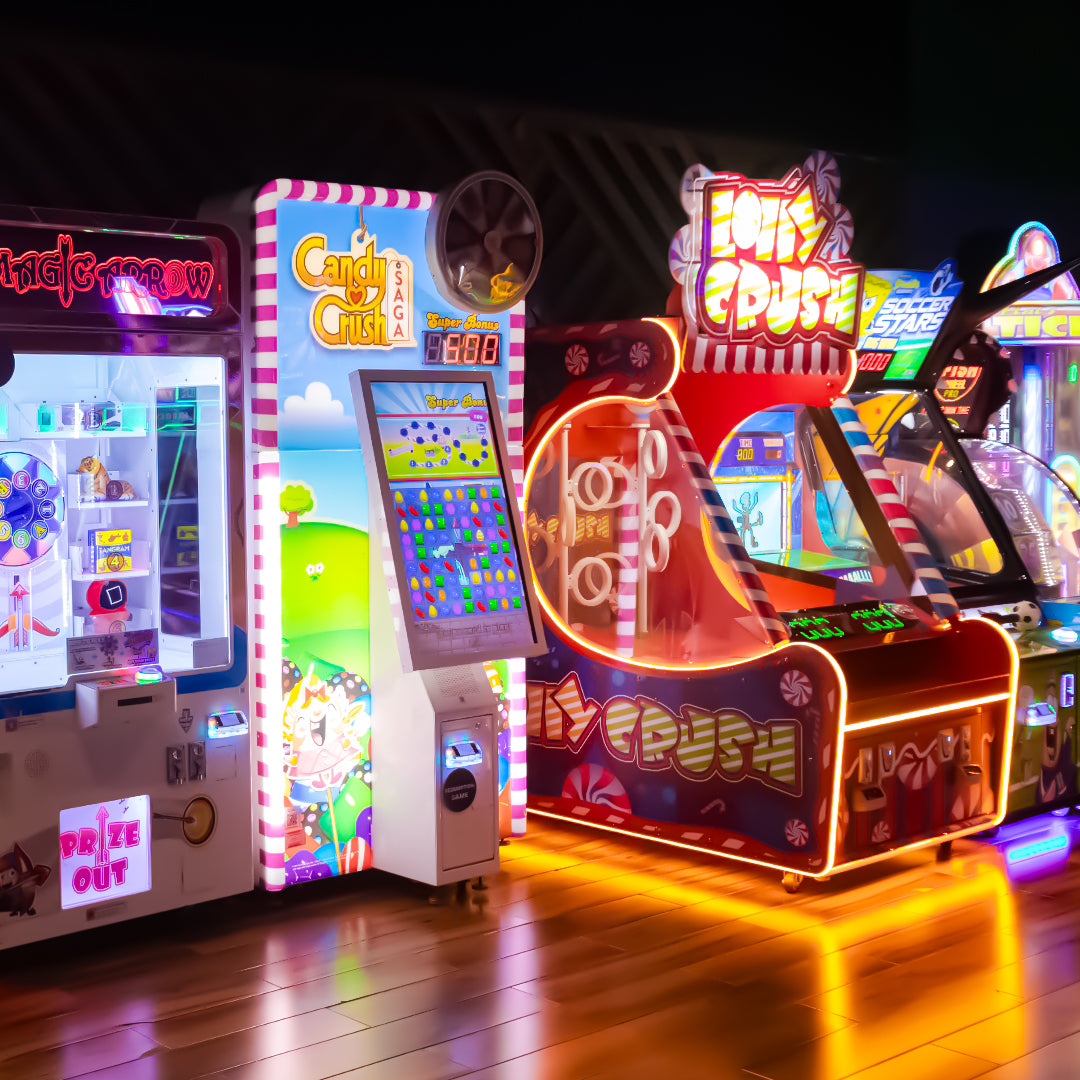 Namco Lolly Crush arcade game with spinning candy ring towers, 1–2 player skill redemption, and versus aim-and-throw gameplay.