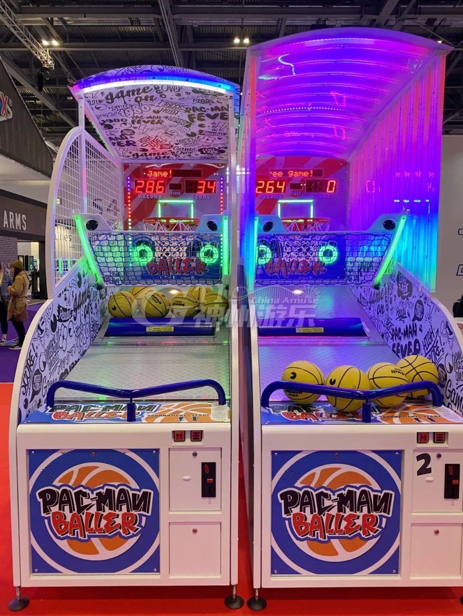 Namco Pac-Man Baller arcade basketball game with moving basket challenge, linkable multiplayer, and branded basketballs.