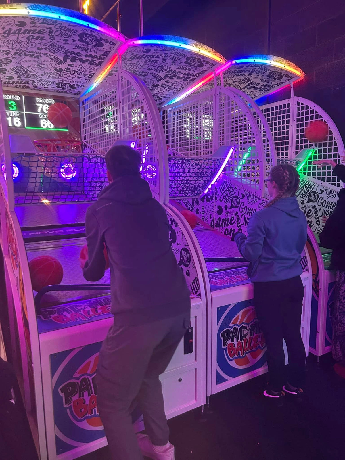 Namco Pac-Man Baller arcade basketball game with moving basket challenge, linkable multiplayer, and branded basketballs.
