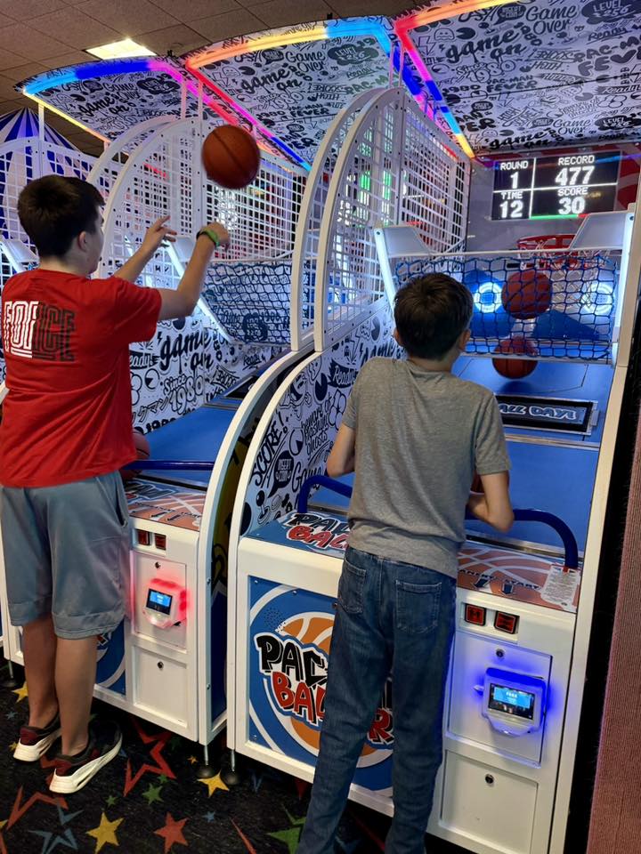 Namco Pac-Man Baller arcade basketball game with moving basket challenge, linkable multiplayer, and branded basketballs.