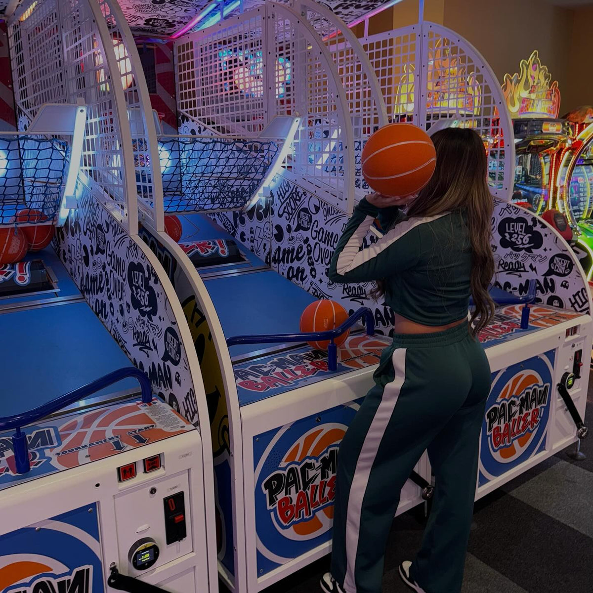 Namco Pac-Man Baller arcade basketball game with moving basket challenge, linkable multiplayer, and branded basketballs.
