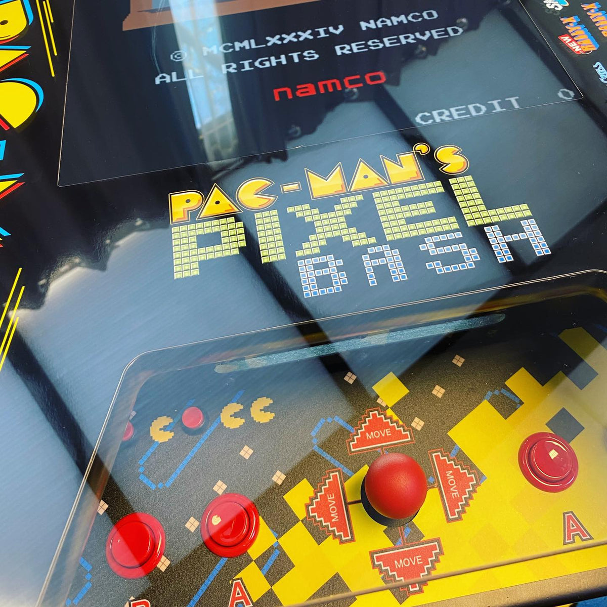 Namco Pac-Man Pixel Bash Bistro high-top arcade game with 32 classic games, retro cocktail table design, and commercial quality.