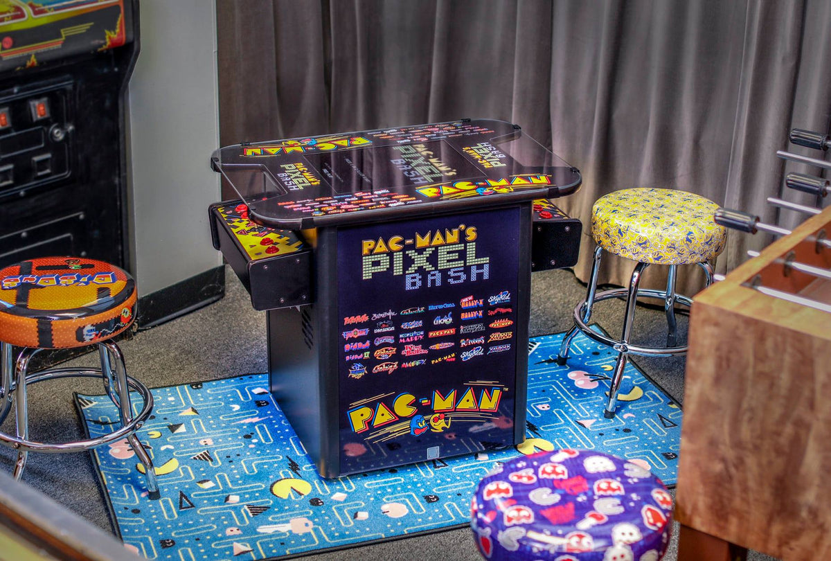 Namco Pac-Man Pixel Bash Bistro high-top arcade game with 32 classic games, retro cocktail table design, and commercial quality.