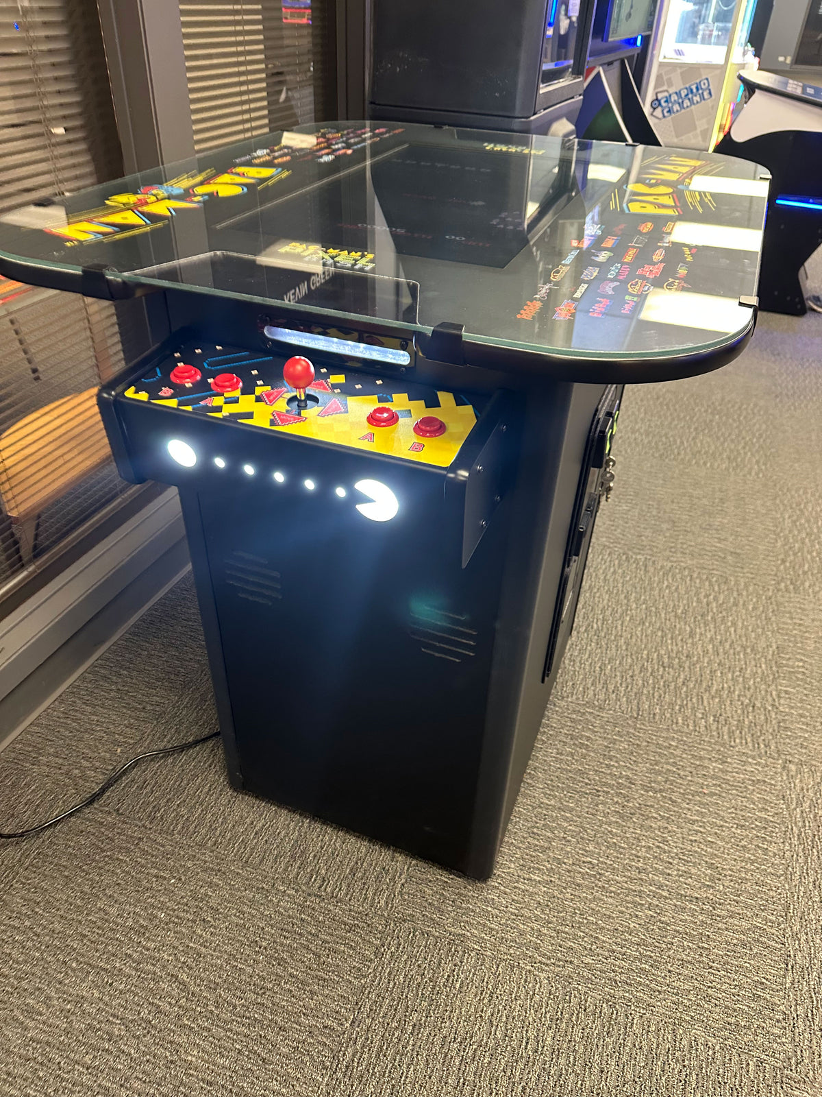 Namco Pac-Man Pixel Bash Bistro high-top arcade game with 32 classic games, retro cocktail table design, and commercial quality.
