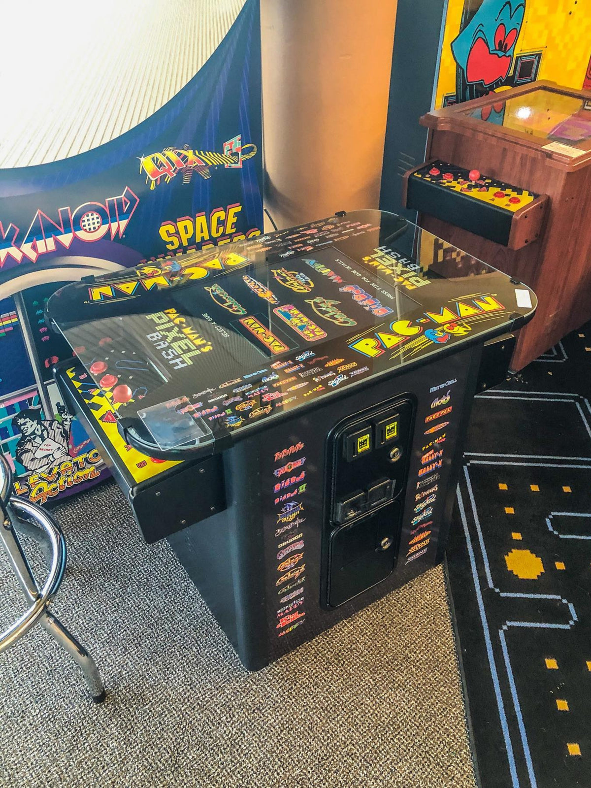 Namco Pac-Man Pixel Bash Bistro high-top arcade game with 32 classic games, retro cocktail table design, and commercial quality.