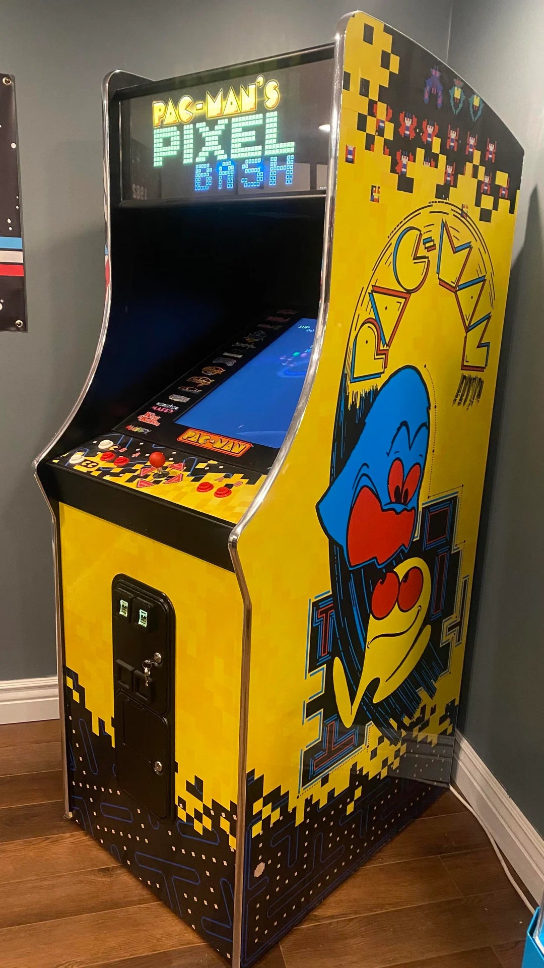 Namco Pac-Man Pixel Bash upright arcade game with 31 classic titles, retro cabinet design, and coin-op or free play options.