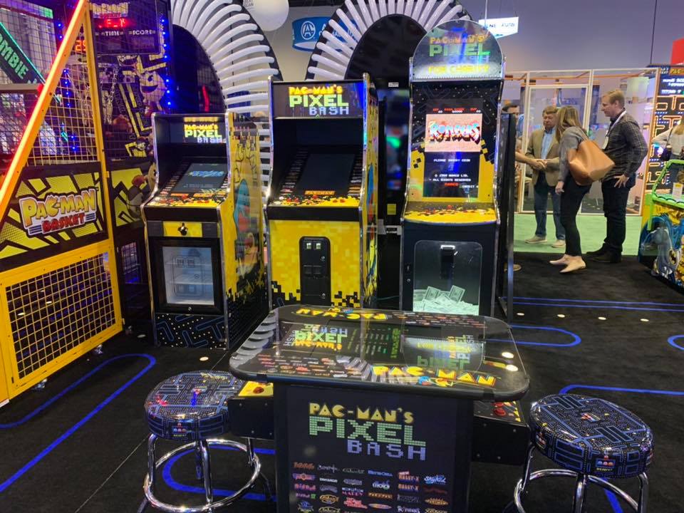 Namco Pac-Man Pixel Bash upright arcade game with 31 classic titles, retro cabinet design, and coin-op or free play options.