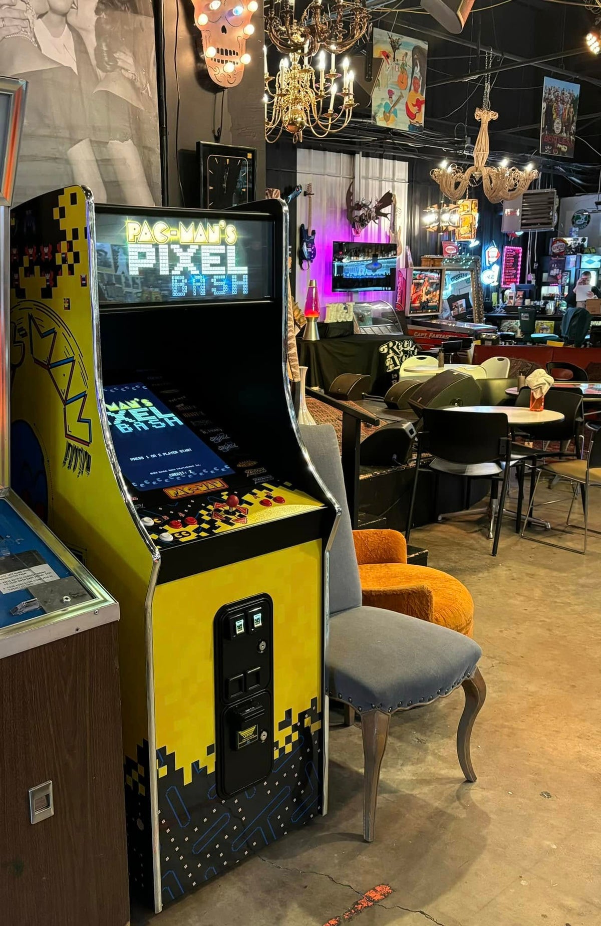 Namco Pac-Man Pixel Bash upright arcade game with 31 classic titles, retro cabinet design, and coin-op or free play options.