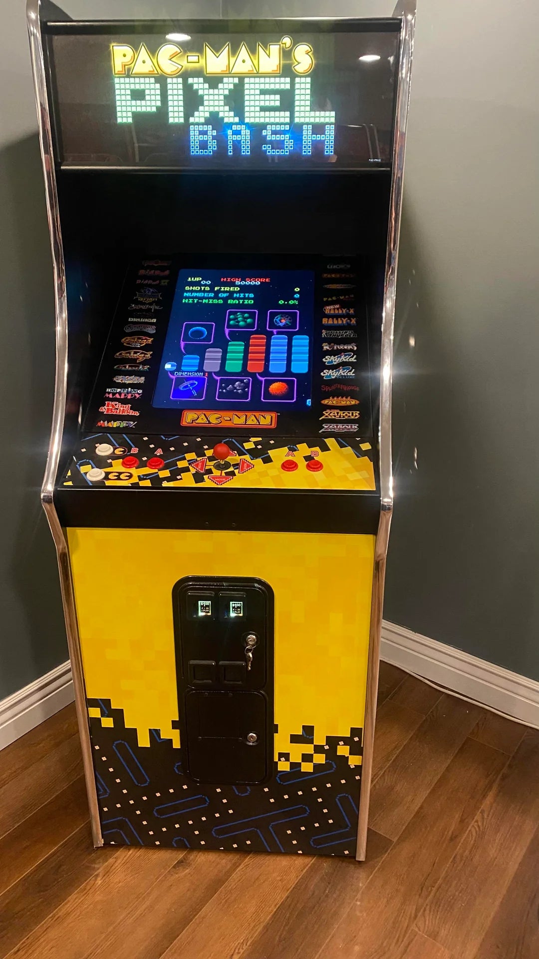 Namco Pac-Man Pixel Bash upright arcade game with 31 classic titles, retro cabinet design, and coin-op or free play options.