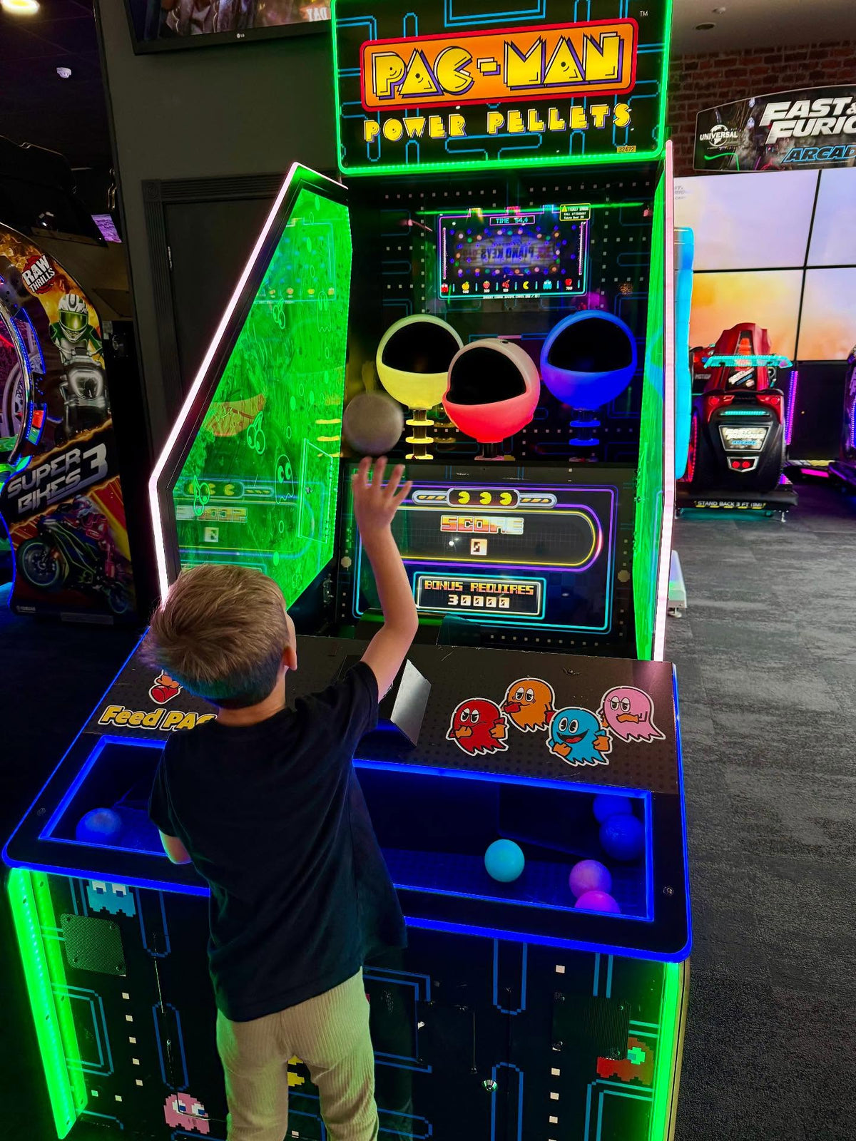 Namco Pac-Man Power Pellets arcade game with ball-throwing skill play, interactive LED playfield, and Power Pellet bonus mode.