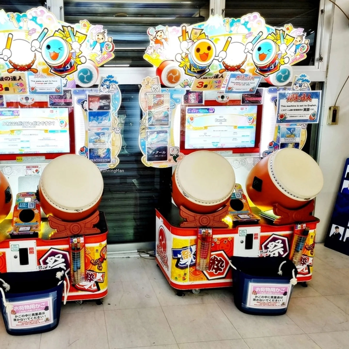 Namco Taiko No Tatsujin Drum 'N Fun arcade game with dual Taiko drums, bachi sticks, LED cabinet, and 1–2 player rhythm gameplay.