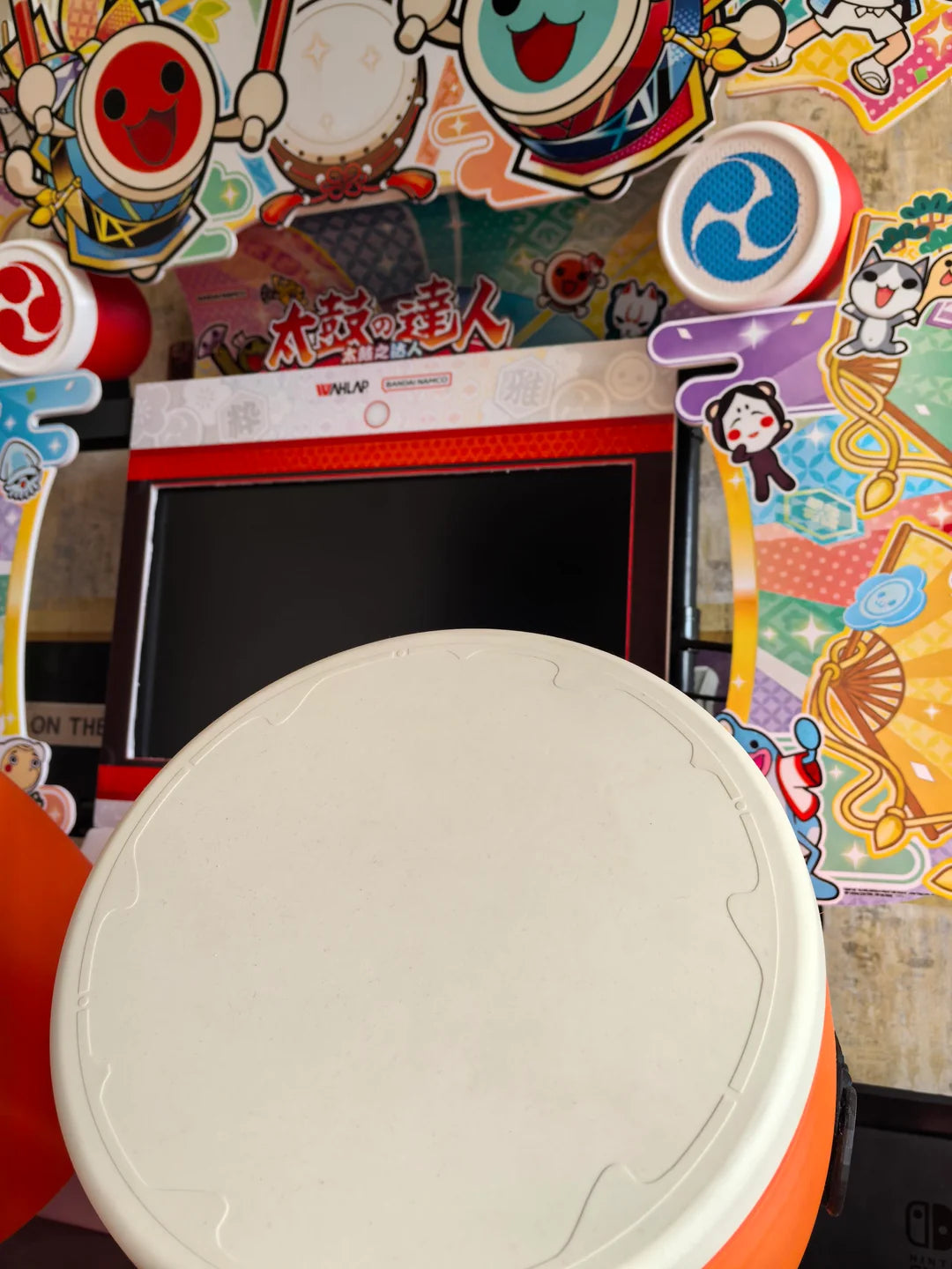Namco Taiko No Tatsujin Drum 'N Fun arcade game with dual Taiko drums, bachi sticks, LED cabinet, and 1–2 player rhythm gameplay.