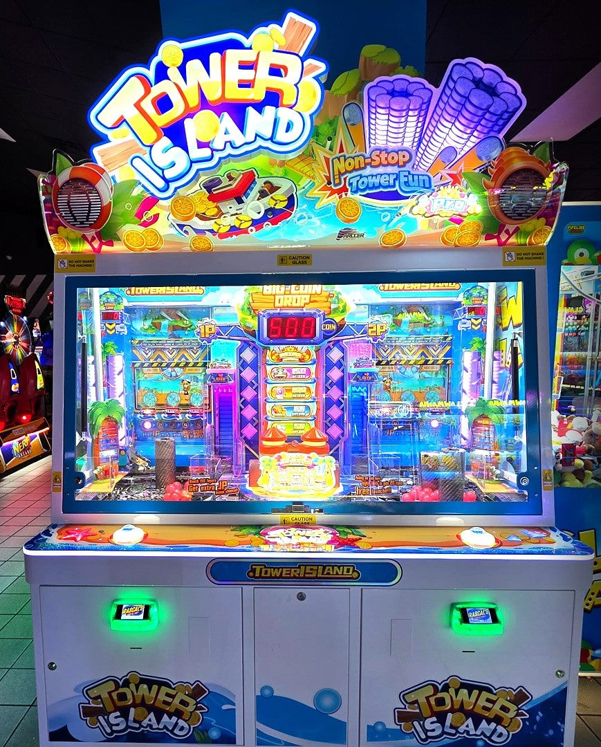 Namco Tower Island 2-player pusher arcade game with multi-level coin pusher action and LED-lit tropical cabinet.