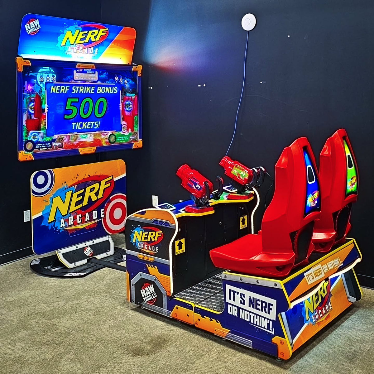 Nerf Arcade 2-player ticket redemption shooter with 65-inch HD display and foam blaster gameplay for all ages.