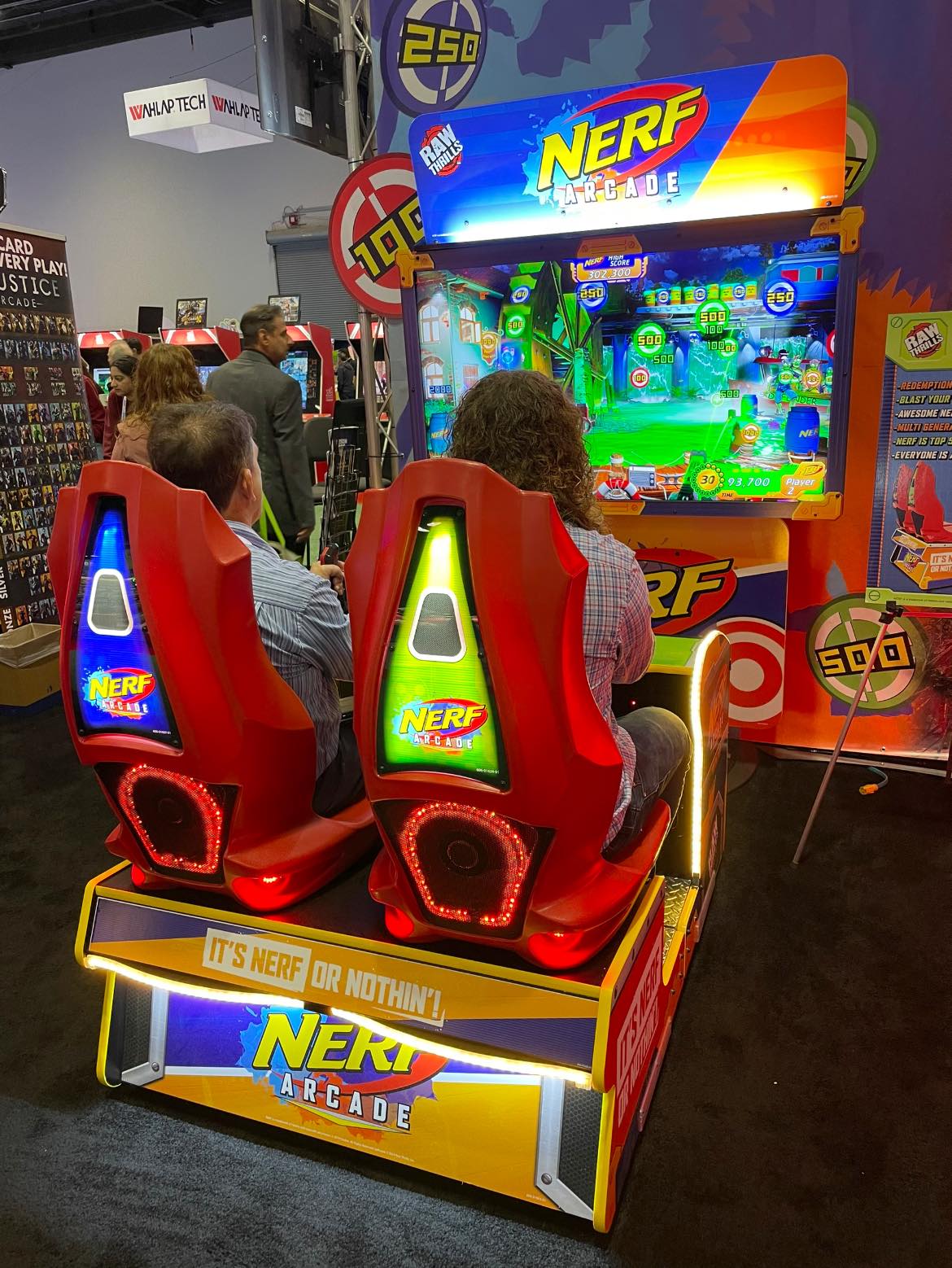 Nerf Arcade 2-player ticket redemption shooter with 65-inch HD display and foam blaster gameplay for all ages.