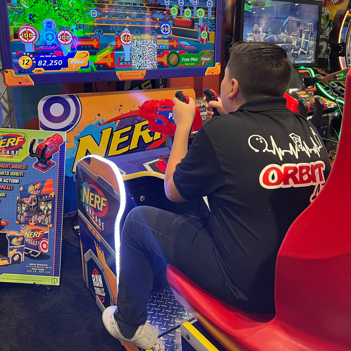 Nerf Arcade 2-player ticket redemption shooter with 65-inch HD display and foam blaster gameplay for all ages.