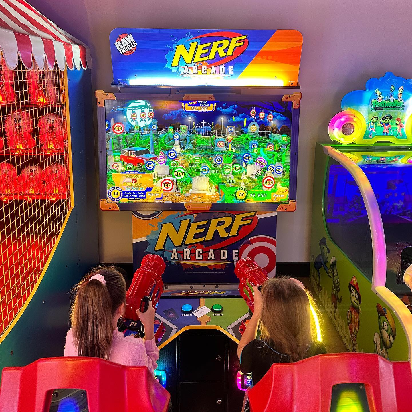 Nerf Arcade Machine - 2 Player Ticket Redemption Shooter | Raw Thrills & Hasbro | 65" HD Display | Foam Blaster Arcade Game for All Ages.