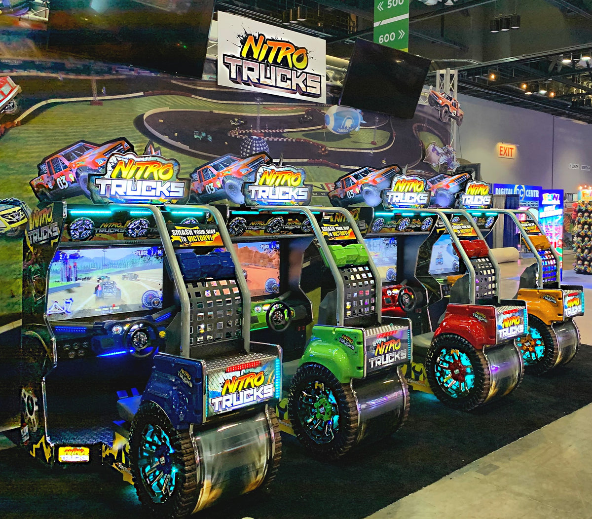 Nitro Trucks arcade machine with 43-inch HD display and force feedback steering for immersive monster truck racing.