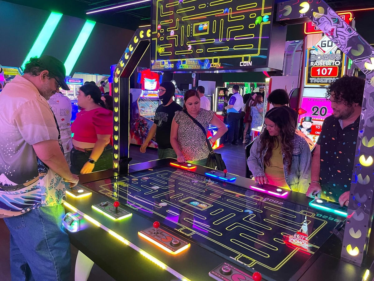 Pac-Man Battle Royale Championship Deluxe arcade game with 8-player competitive gameplay, LED cabinet, and power-up ghost battles.