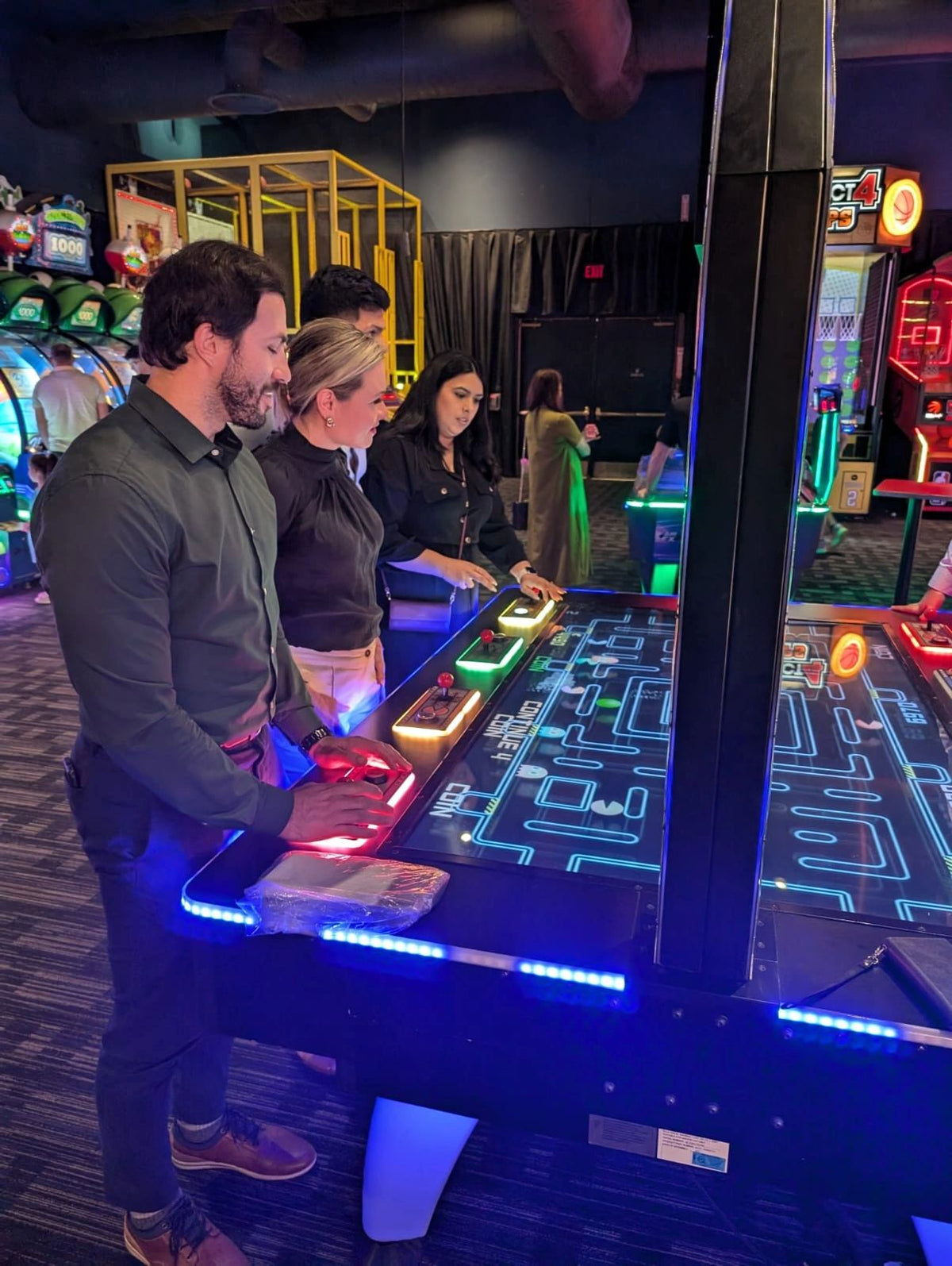 Pac-Man Battle Royale Championship Deluxe arcade game with 8-player competitive gameplay, LED cabinet, and power-up ghost battles.