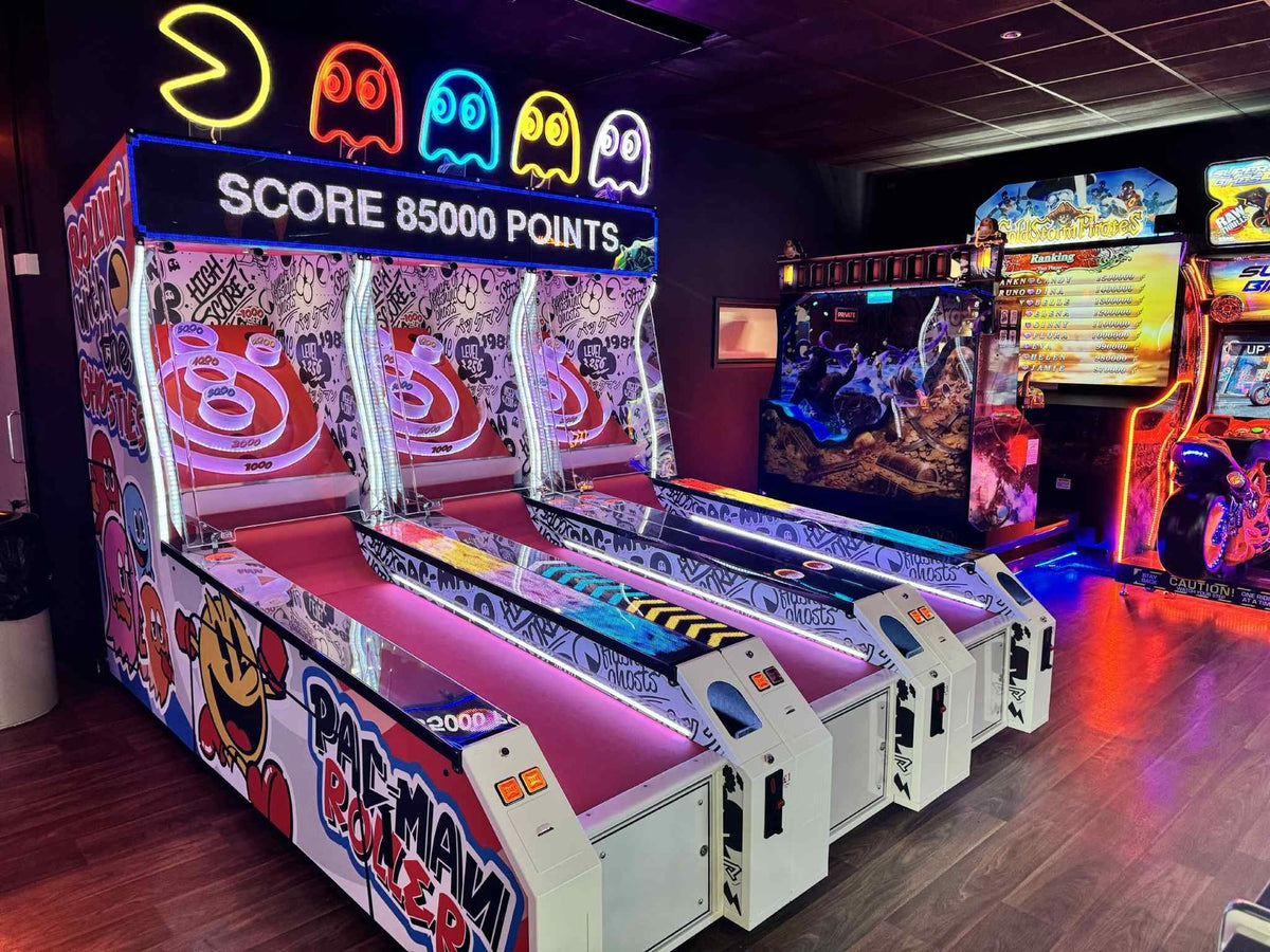 Front view of Namco Pac-Man Roller Alley arcade roller game with digital score display