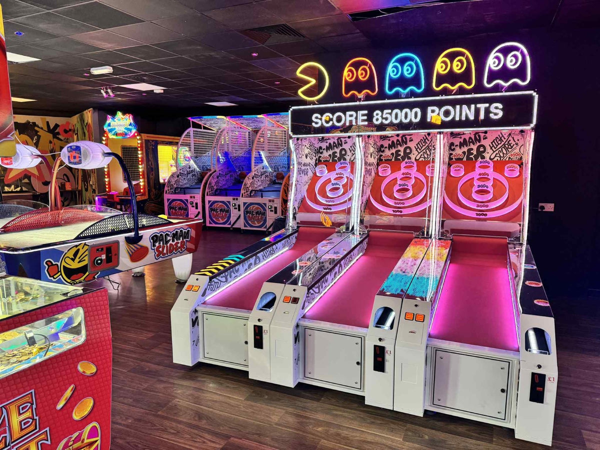 Front view of Namco Pac-Man Roller Alley arcade roller game with digital score display