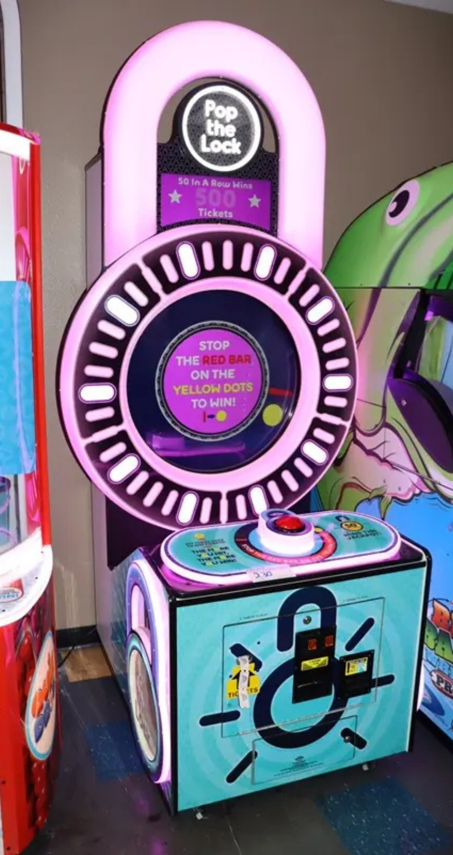 Pop the Lock arcade machine with circular LED lock display, fast-paced button timing gameplay, and bright cabinet graphics