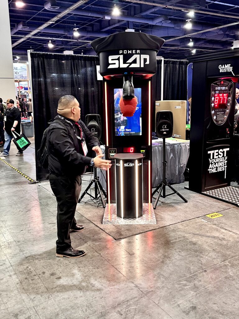 Power Slap arcade game for testing strength and reflexes with high-impact gameplay.