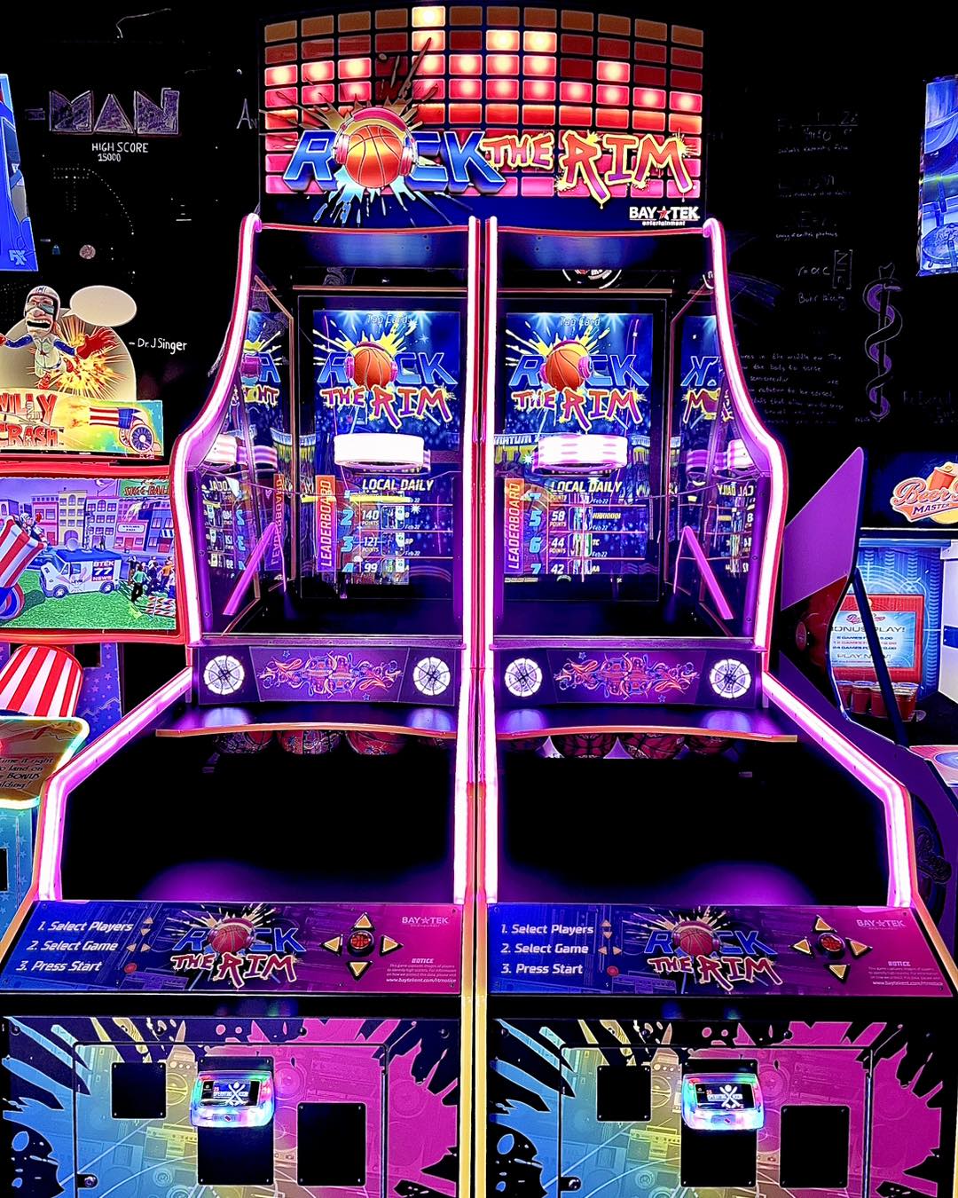 Rock the Rim next-gen basketball arcade machine with LED hoop lighting, interactive sensors, and dynamic scoring display