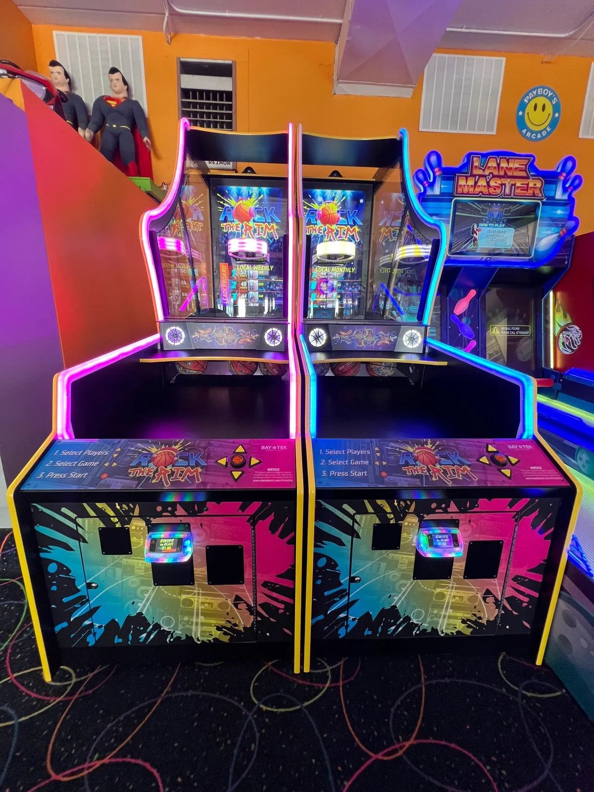 Rock the Rim next-gen basketball arcade machine with LED hoop lighting, interactive sensors, and dynamic scoring display