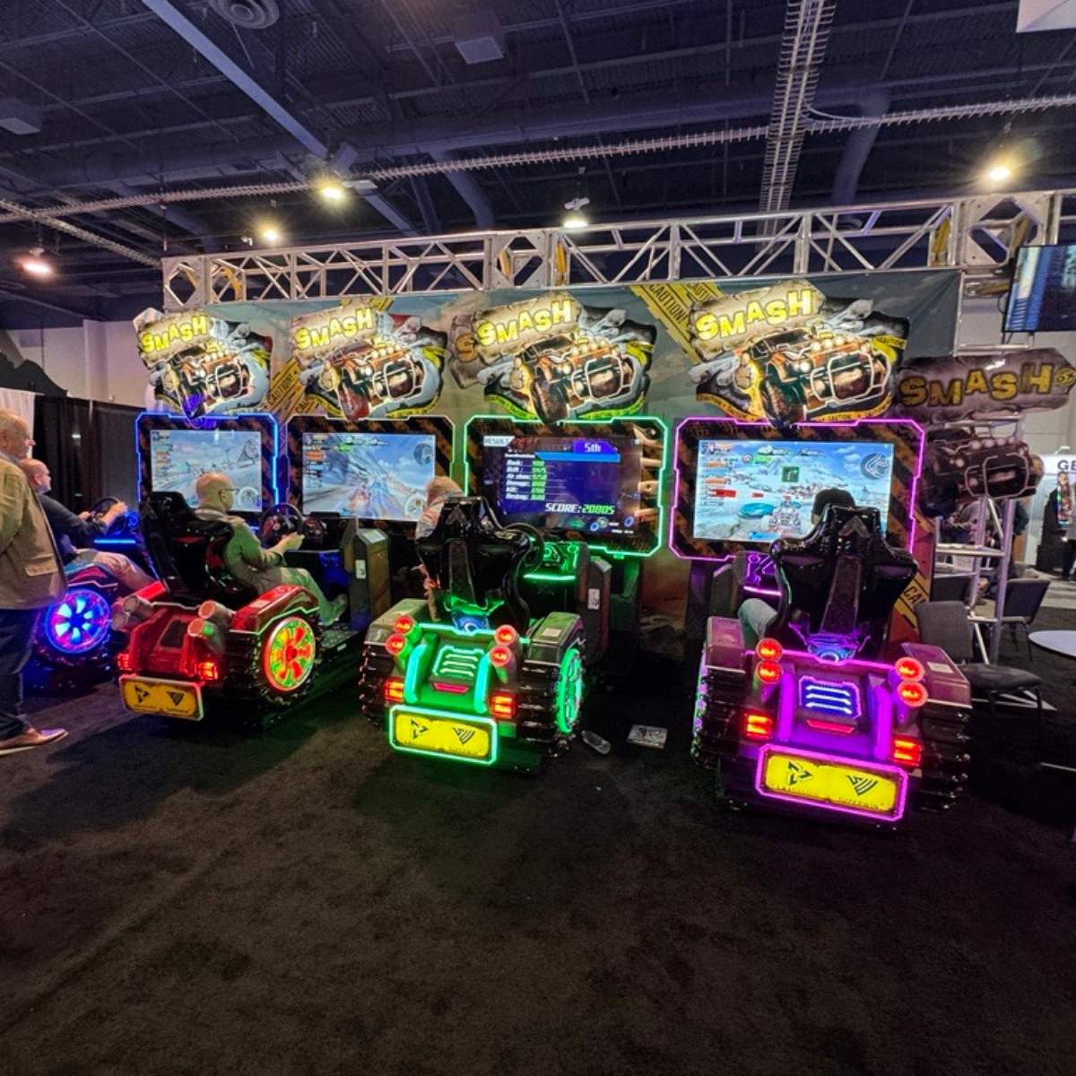 SMASH DX off-road racing arcade machine with motion seat, power-up battles, and linkable 4-player gameplay.