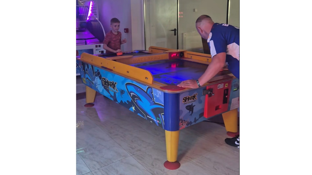 Shark Air Hockey 8ft table with illuminated waterproof playfield and large arcade design.