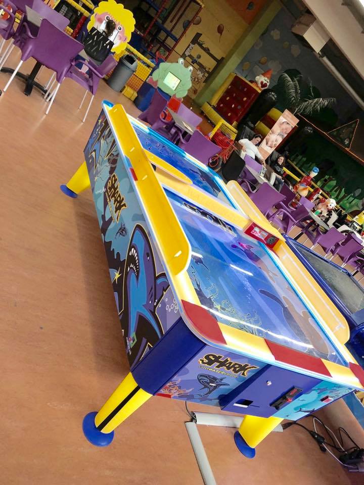 Shark Air Hockey 6ft table with illuminated waterproof playfield for fast arcade gameplay.