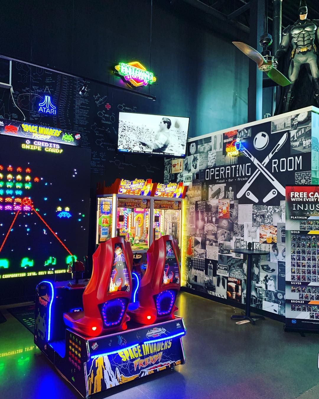 Space Invaders Frenzy arcade machine with giant 109-inch LED screen and 2-player ticket redemption gameplay.